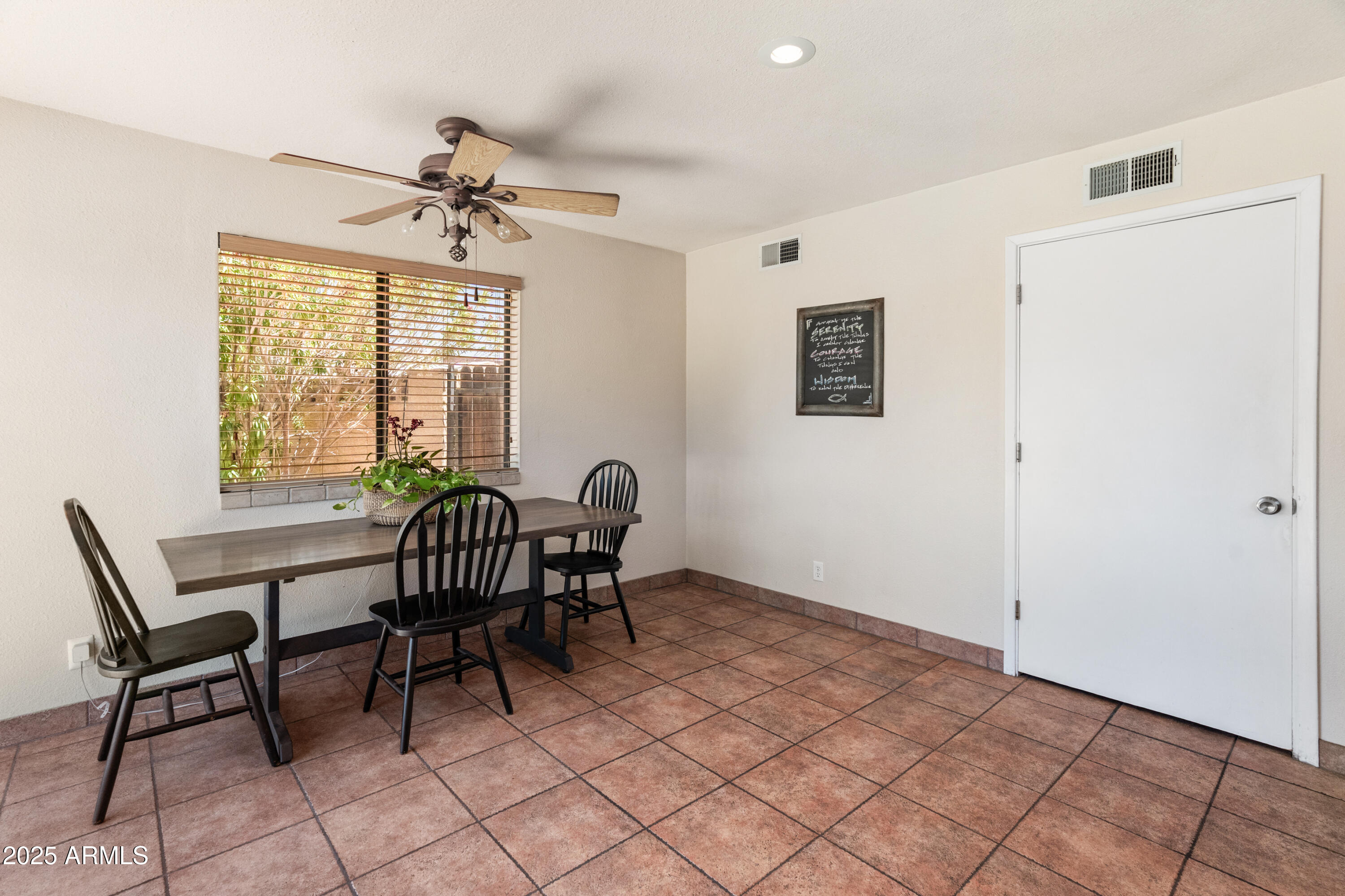 6931 East Pershing Avenue Scottsdale, AZ 85254 - Photo 40 of 59 a view of a livingroom with furniture and a window
