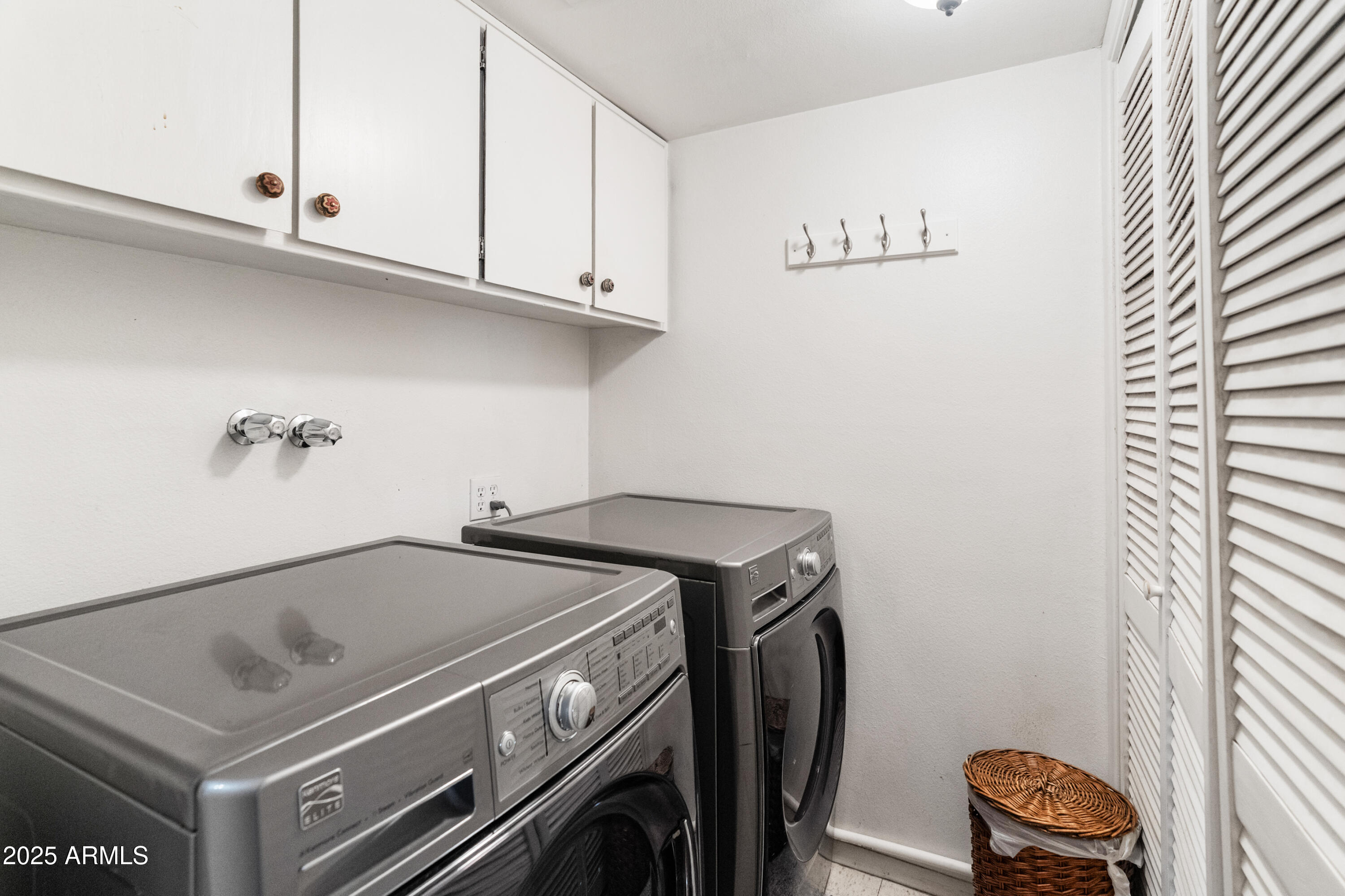 6931 East Pershing Avenue Scottsdale, AZ 85254 - Photo 43 of 59 a utility room with dryer and washer