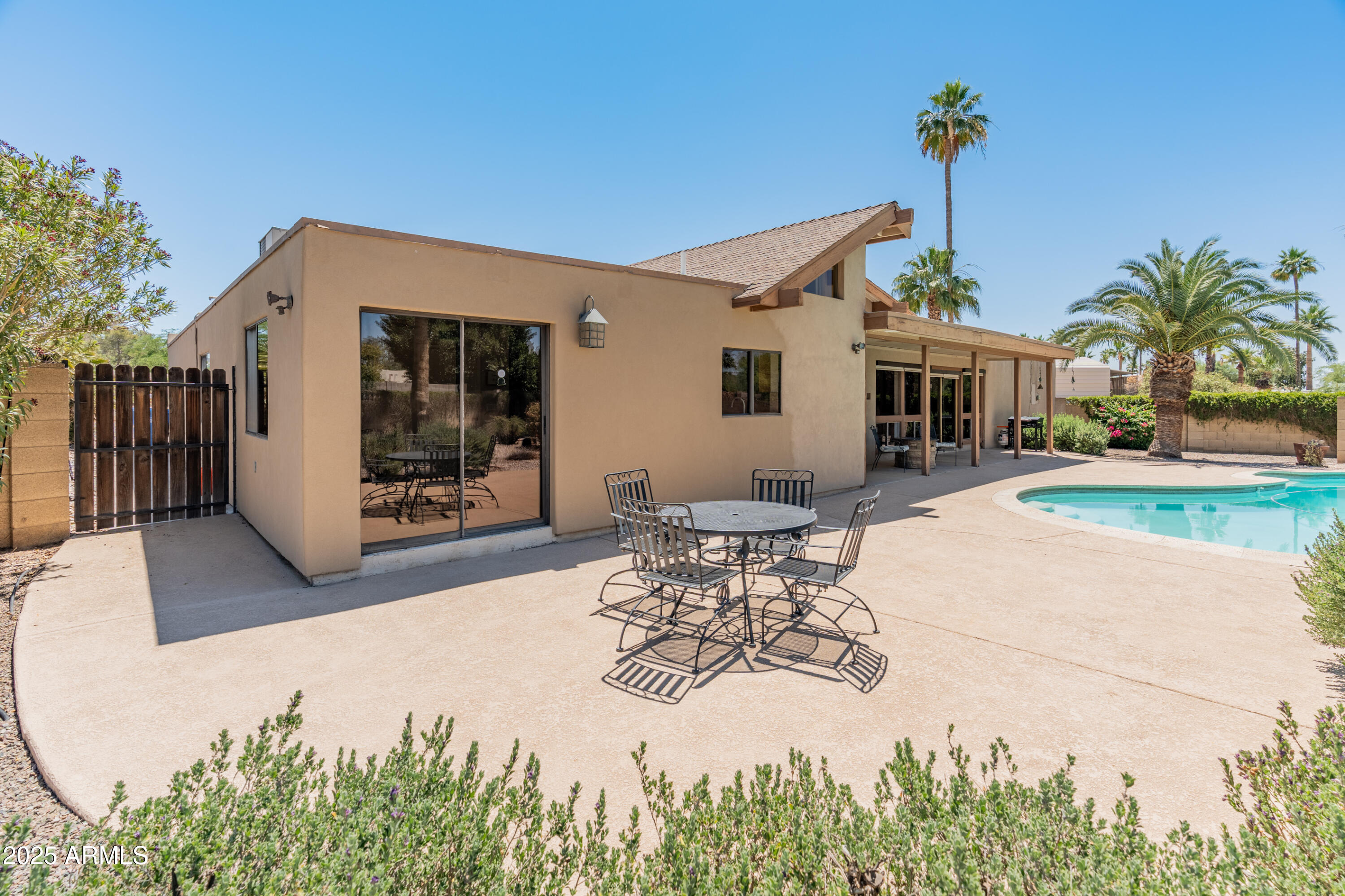 6931 East Pershing Avenue Scottsdale, AZ 85254 - Photo 49 of 59 a view of a house with patio