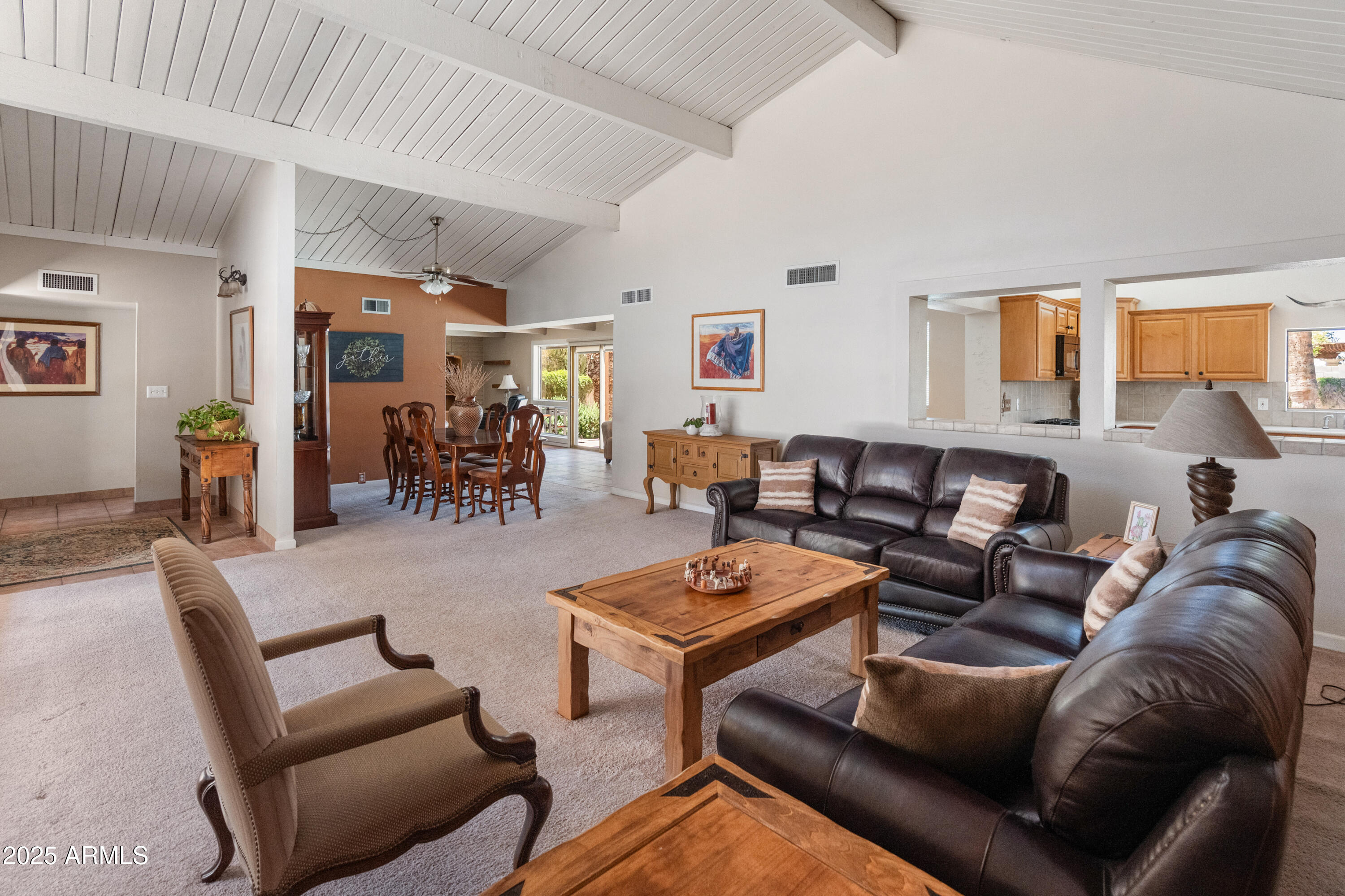 6931 East Pershing Avenue Scottsdale, AZ 85254 - Photo 5 of 59 a living room with furniture kitchen view and a window