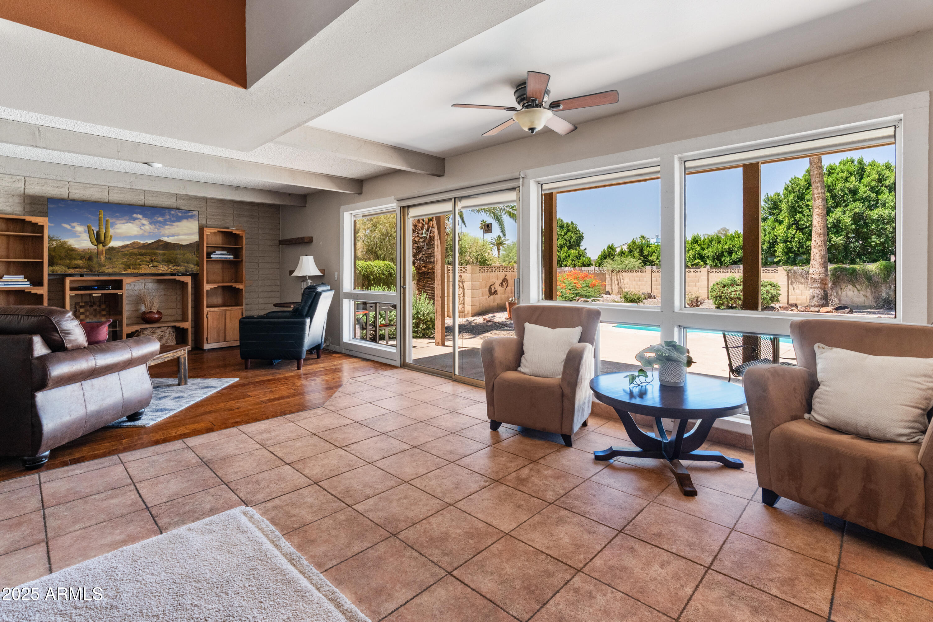 6931 East Pershing Avenue Scottsdale, AZ 85254 - Photo 8 of 59 a living room with furniture and a large window