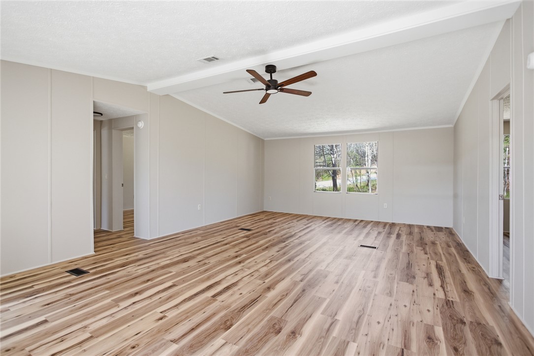 202 Greenbriar Drive Seneca, SC 29678 - Photo 14 of 37 This living area features rich wood flooring, crisp walls, and natural light.