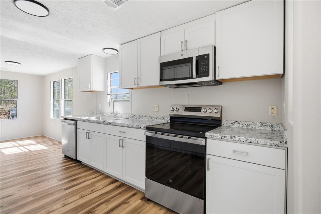 202 Greenbriar Drive Seneca, SC 29678 - Photo 20 of 37 Bright and open kitchen with modern appliances and ample counter space.
