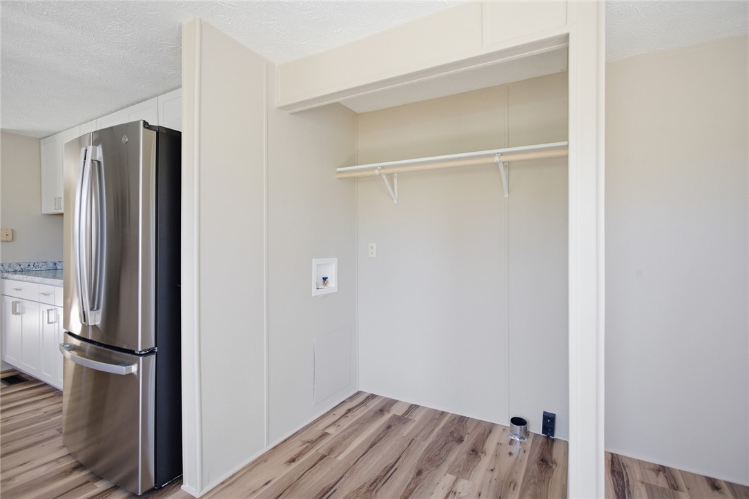 202 Greenbriar Drive Seneca, SC 29678 - Photo 24 of 37 This dedicated laundry space offers convenience and functional design, complemented by nearby kitchen amenities.