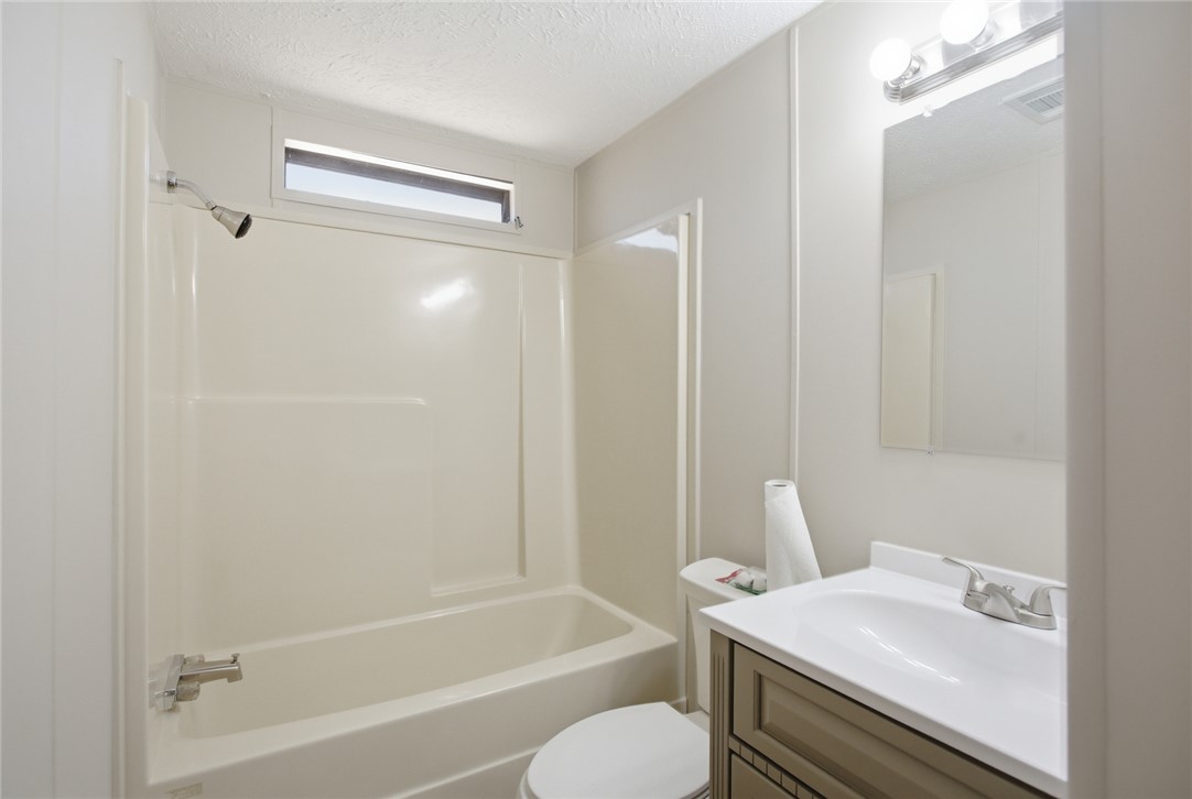 202 Greenbriar Drive Seneca, SC 29678 - Photo 35 of 37 This bathroom provides functionality and light, a classic and clean design.