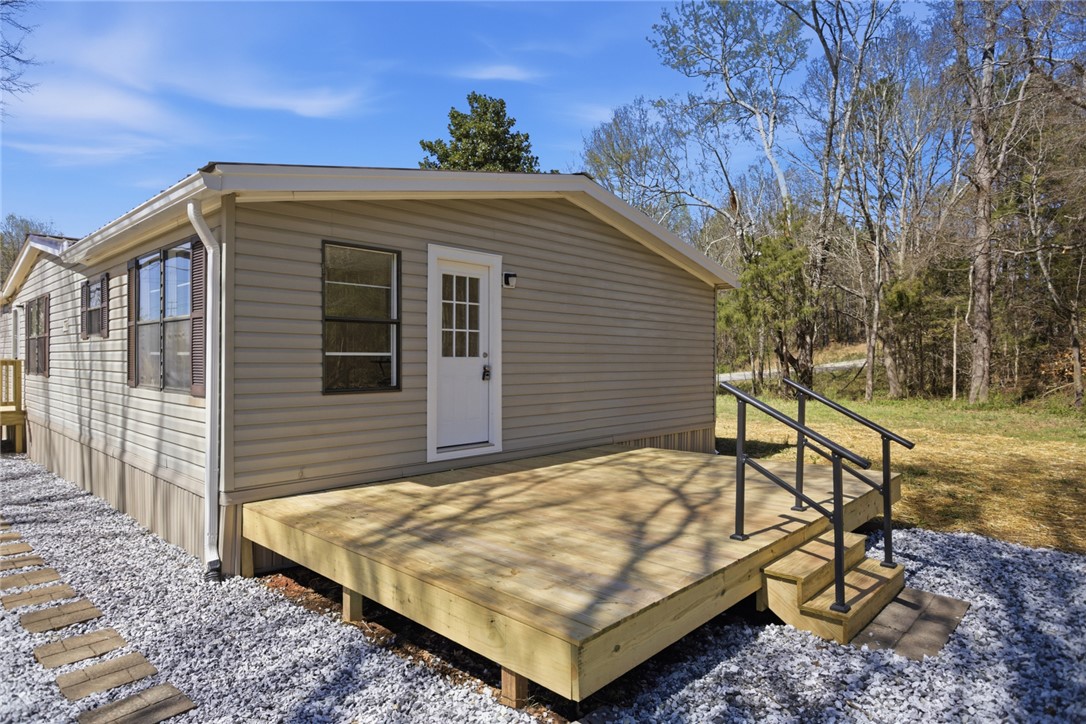 202 Greenbriar Drive Seneca, SC 29678 - Photo 10 of 37 This charming home offers a spacious deck, perfect for enjoying the peaceful wooded surroundings.