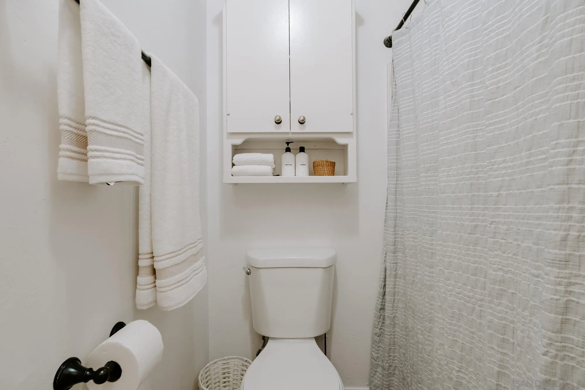 1560 South Grade Road Alpine, CA 91901 - Photo 14 of 48 a bathroom with a toilet and a sink
