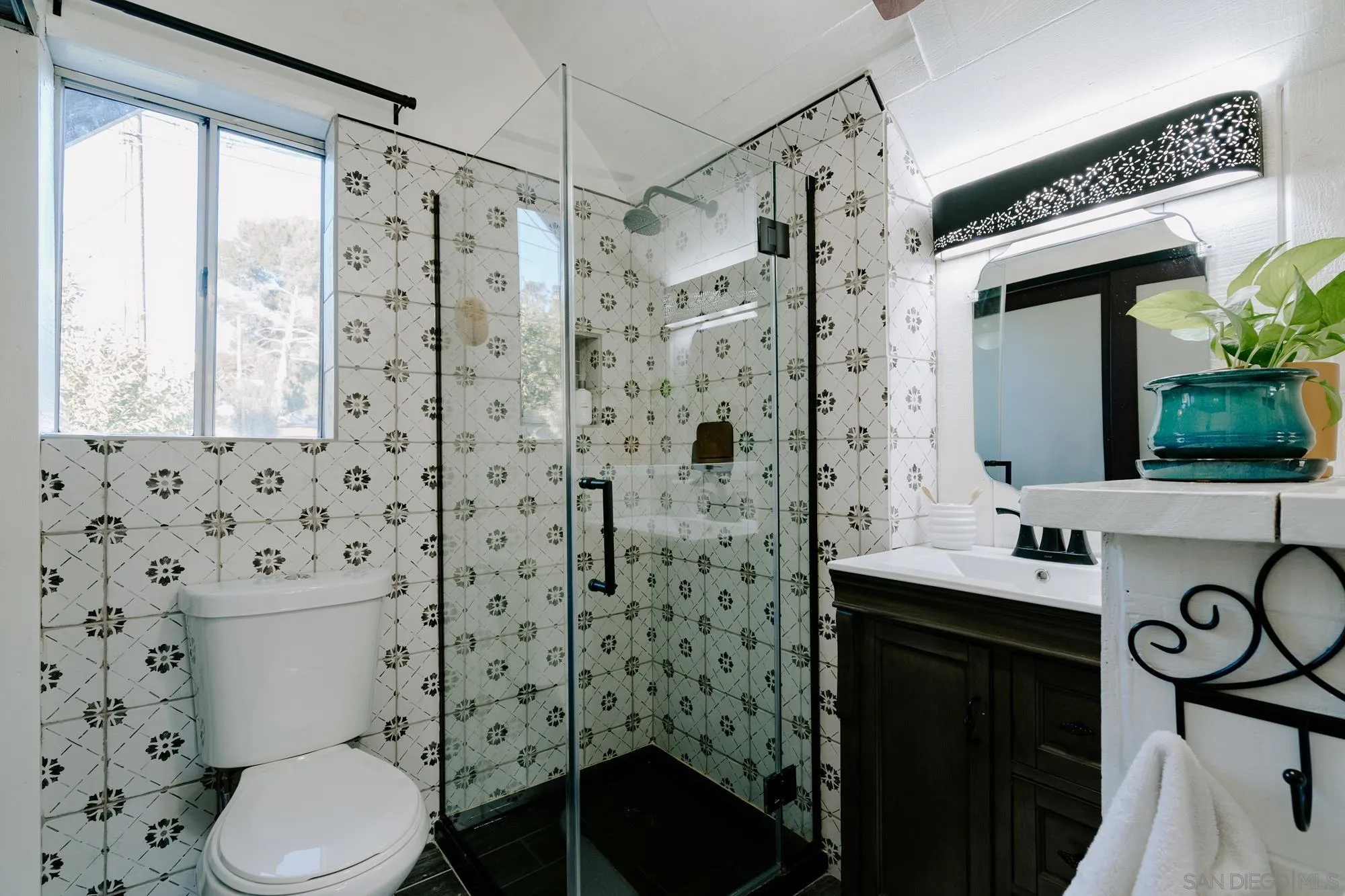 1560 South Grade Road Alpine, CA 91901 - Photo 21 of 48 a bathroom with a sink a toilet and shower