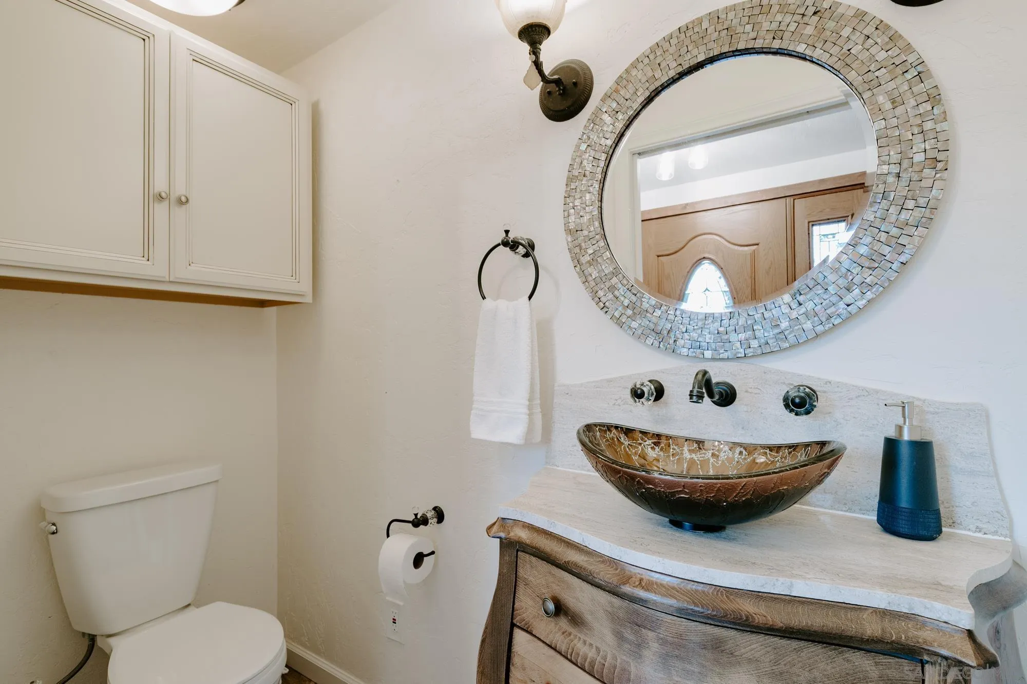 1560 South Grade Road Alpine, CA 91901 - Photo 24 of 48 a bathroom with a toilet and a mirror
