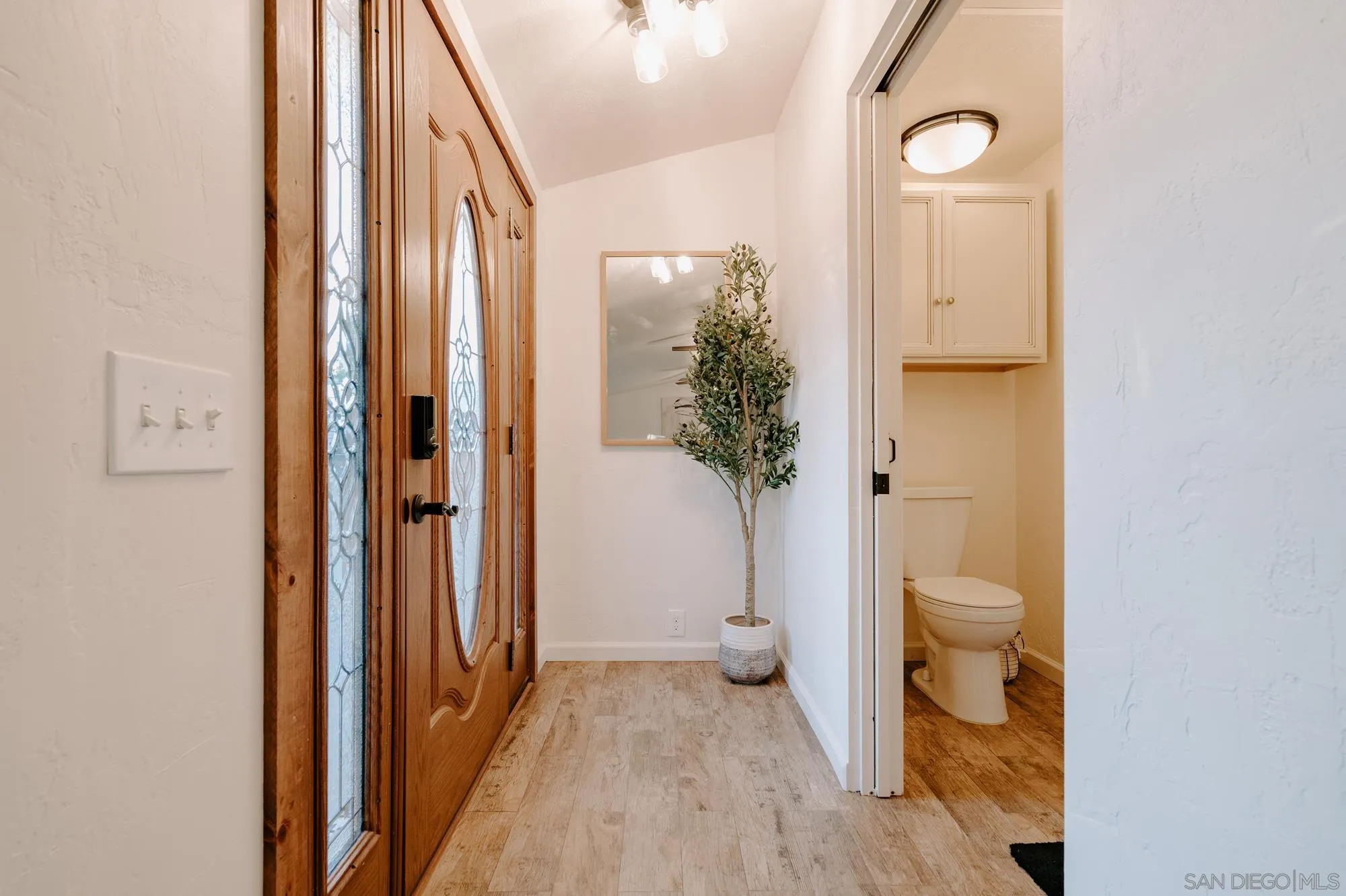 1560 South Grade Road Alpine, CA 91901 - Photo 25 of 48 a bathroom with a toilet and a shower