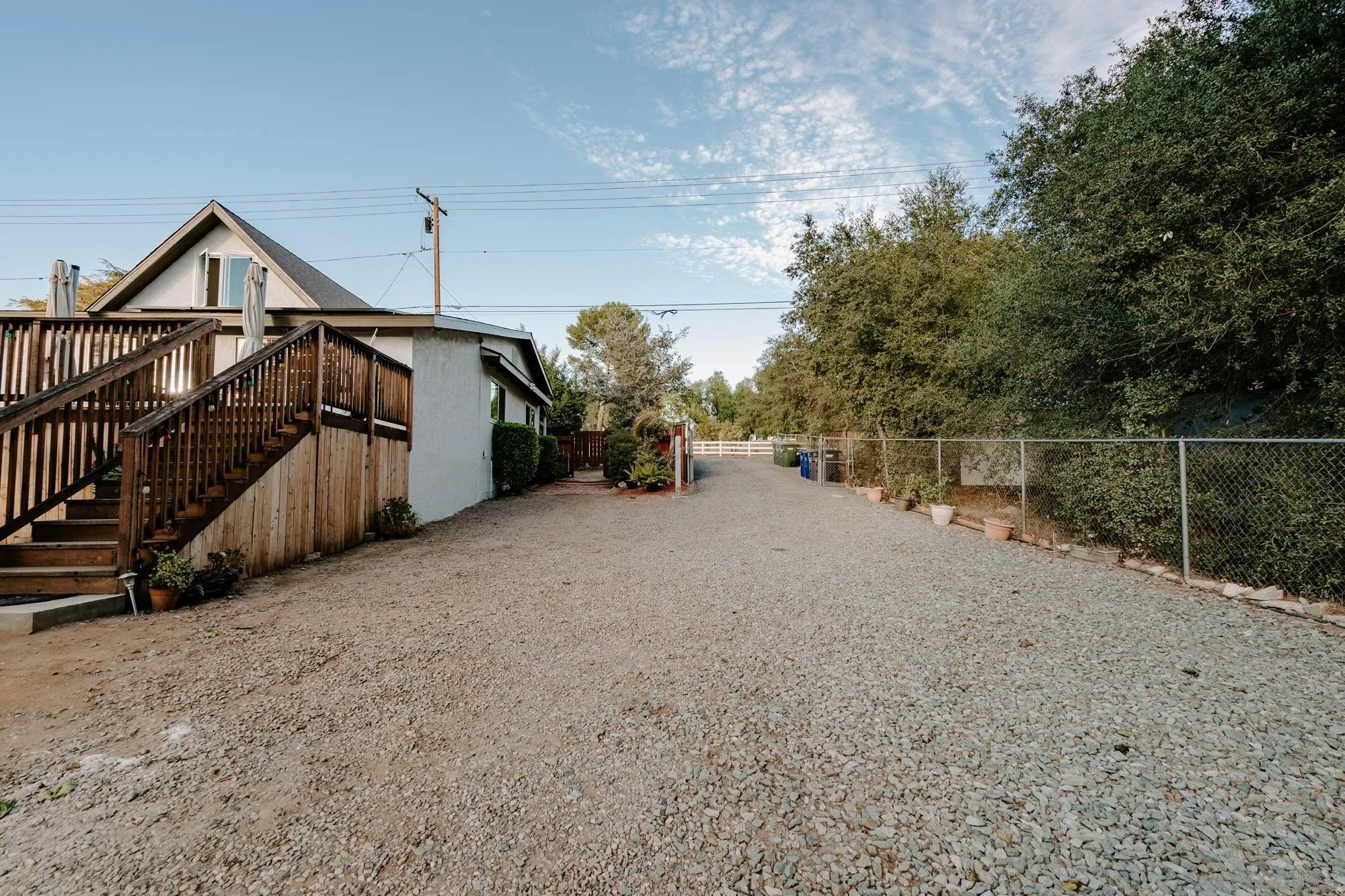1560 South Grade Road Alpine, CA 91901 - Photo 30 of 48 a view of a house with backyard and trees