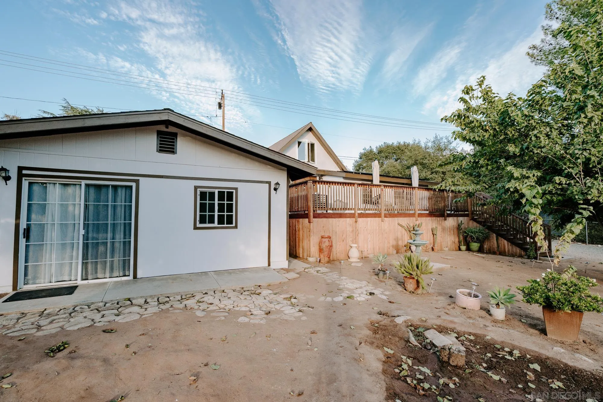 1560 South Grade Road Alpine, CA 91901 - Photo 32 of 48 a view of a house with a wooden fence