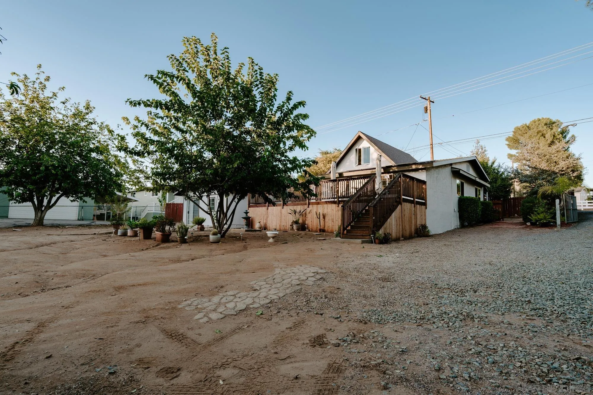 1560 South Grade Road Alpine, CA 91901 - Photo 42 of 48 a view of a house with a yard and garage
