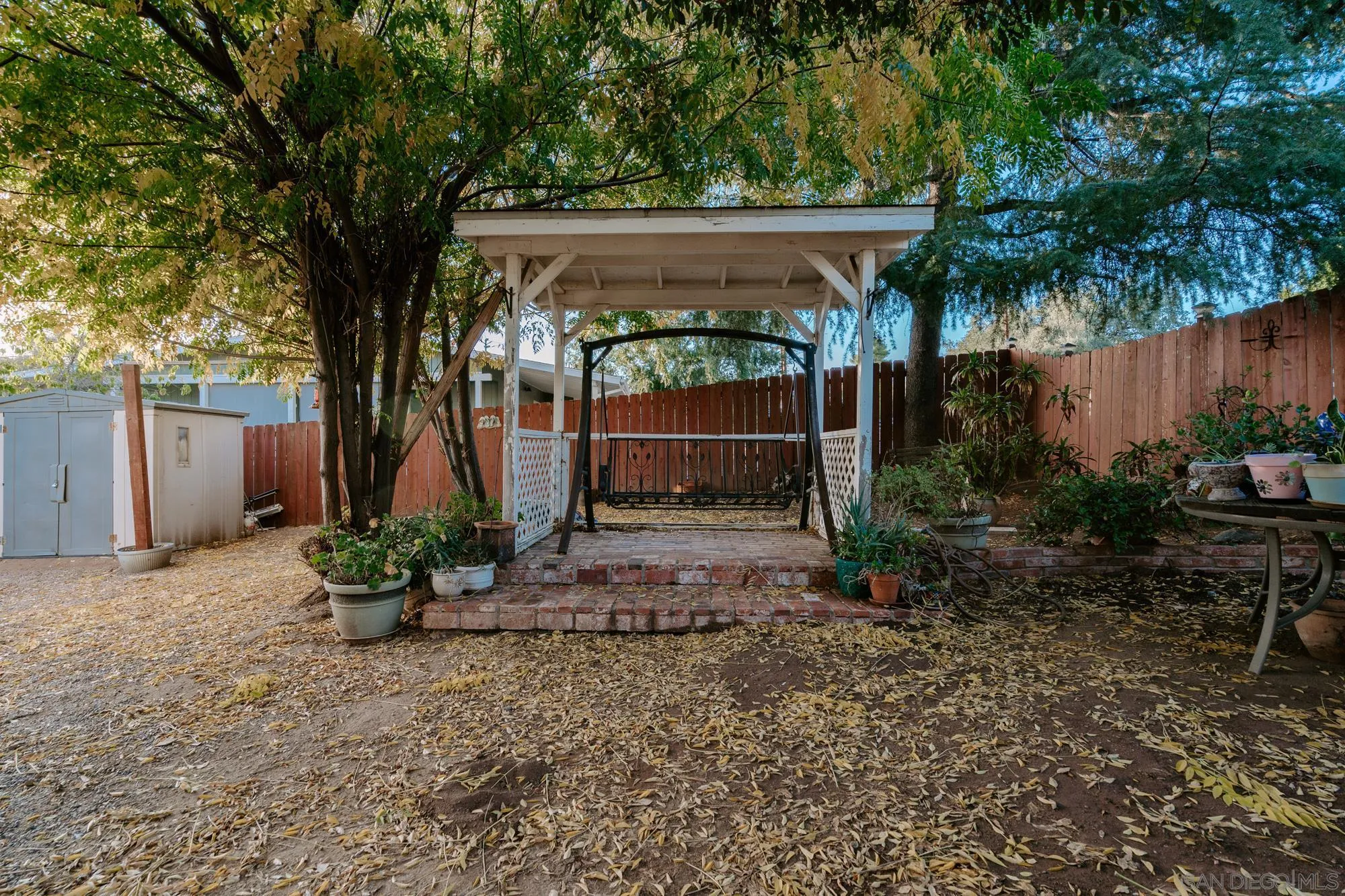 1560 South Grade Road Alpine, CA 91901 - Photo 47 of 48 a front view of a house with garden
