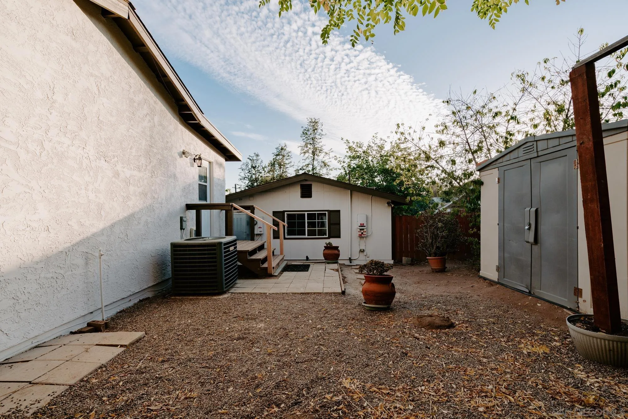 1560 South Grade Road Alpine, CA 91901 - Photo 48 of 48 a backyard of a house with garden and barbeque oven