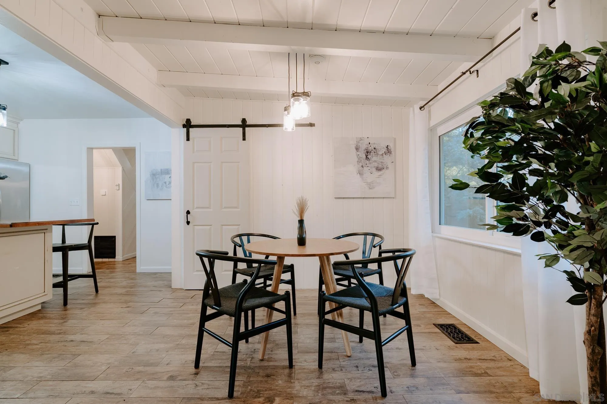 1560 South Grade Road Alpine, CA 91901 - Photo 6 of 48 a view of a dining room with furniture and wooden floor