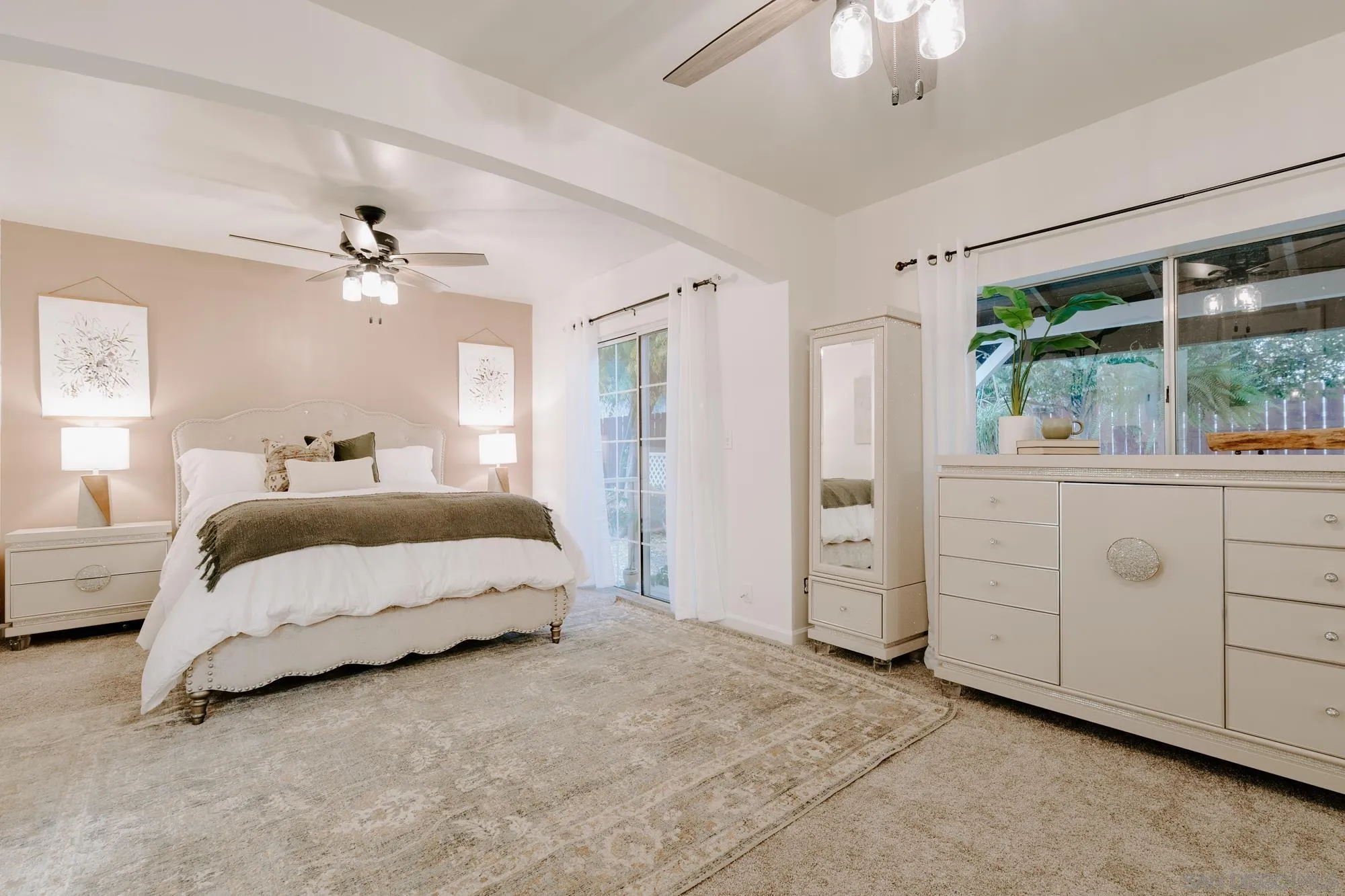 1560 South Grade Road Alpine, CA 91901 - Photo 10 of 48 a spacious bedroom with a large bed and a chandelier