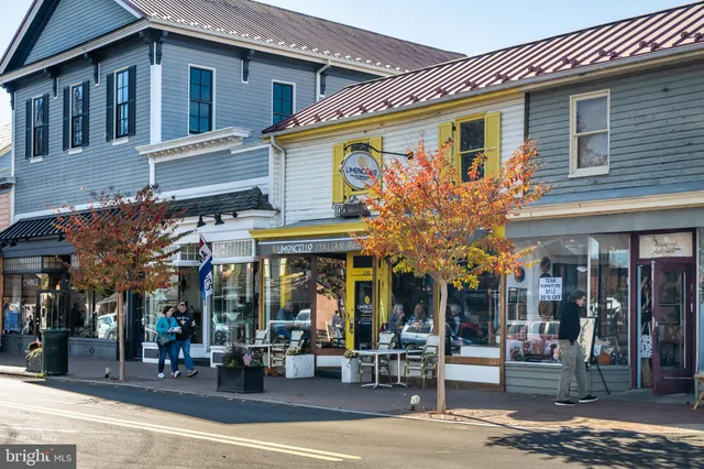 a view of a cafe with a outdoor seating