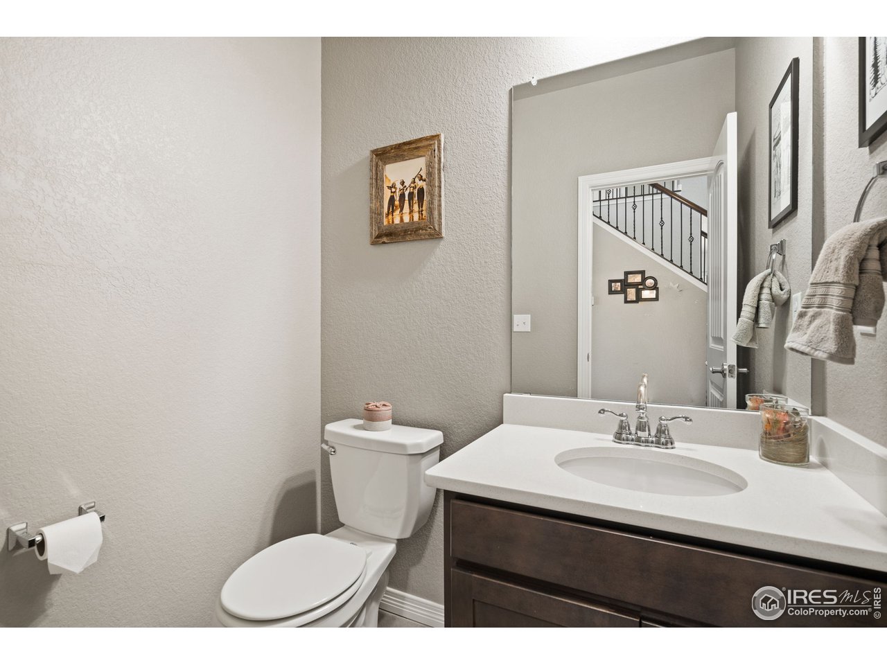 2499 Likens Drive Berthoud, CO 80513 - Photo 21 of 33 a bathroom with a sink a toilet and mirror