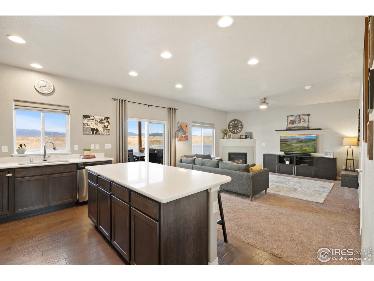 2499 Likens Drive Berthoud, CO 80513 - Photo 5 of 33 a large kitchen with a table and chairs