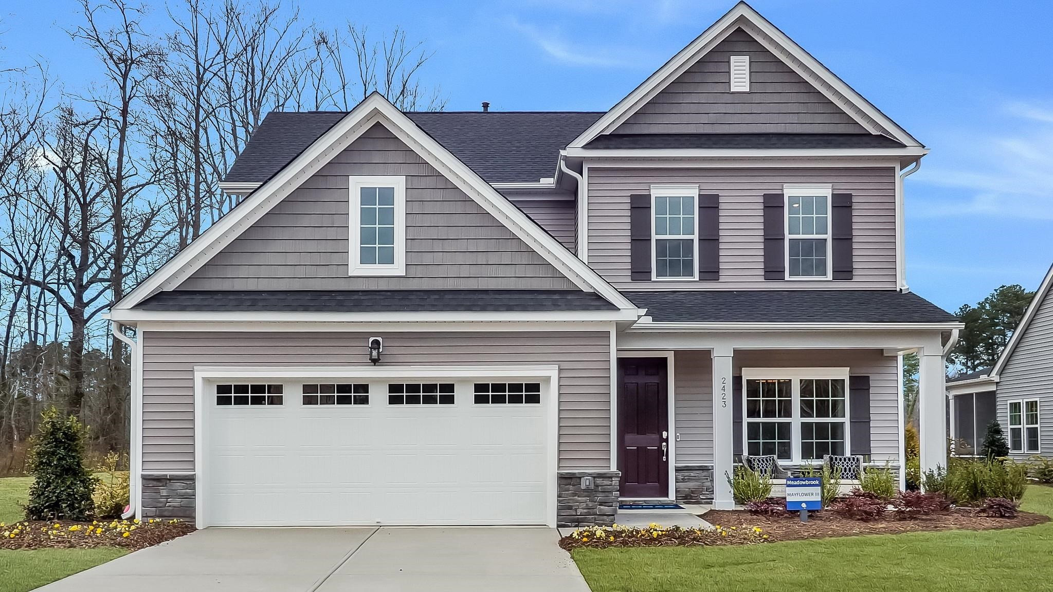 428 Salt Marsh Trail Raleigh, NC 27610 - Photo 1 of 35 front view of a house with a yard