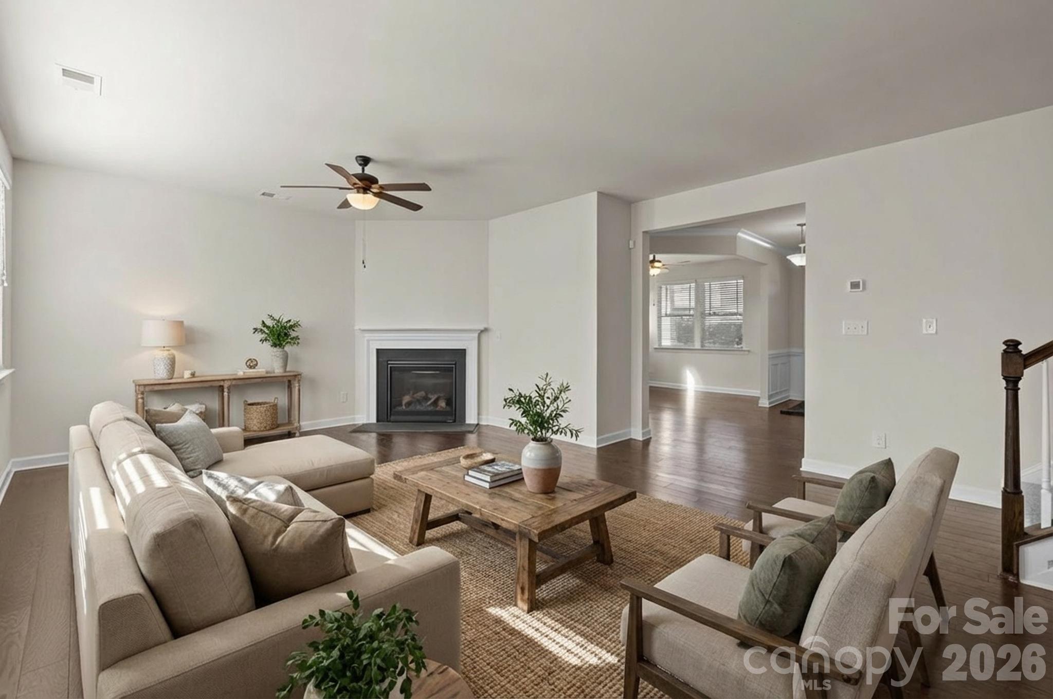1440 Imperial Court York, SC 29745 - Photo 13 of 47 a living room with furniture a fireplace and a chandelier