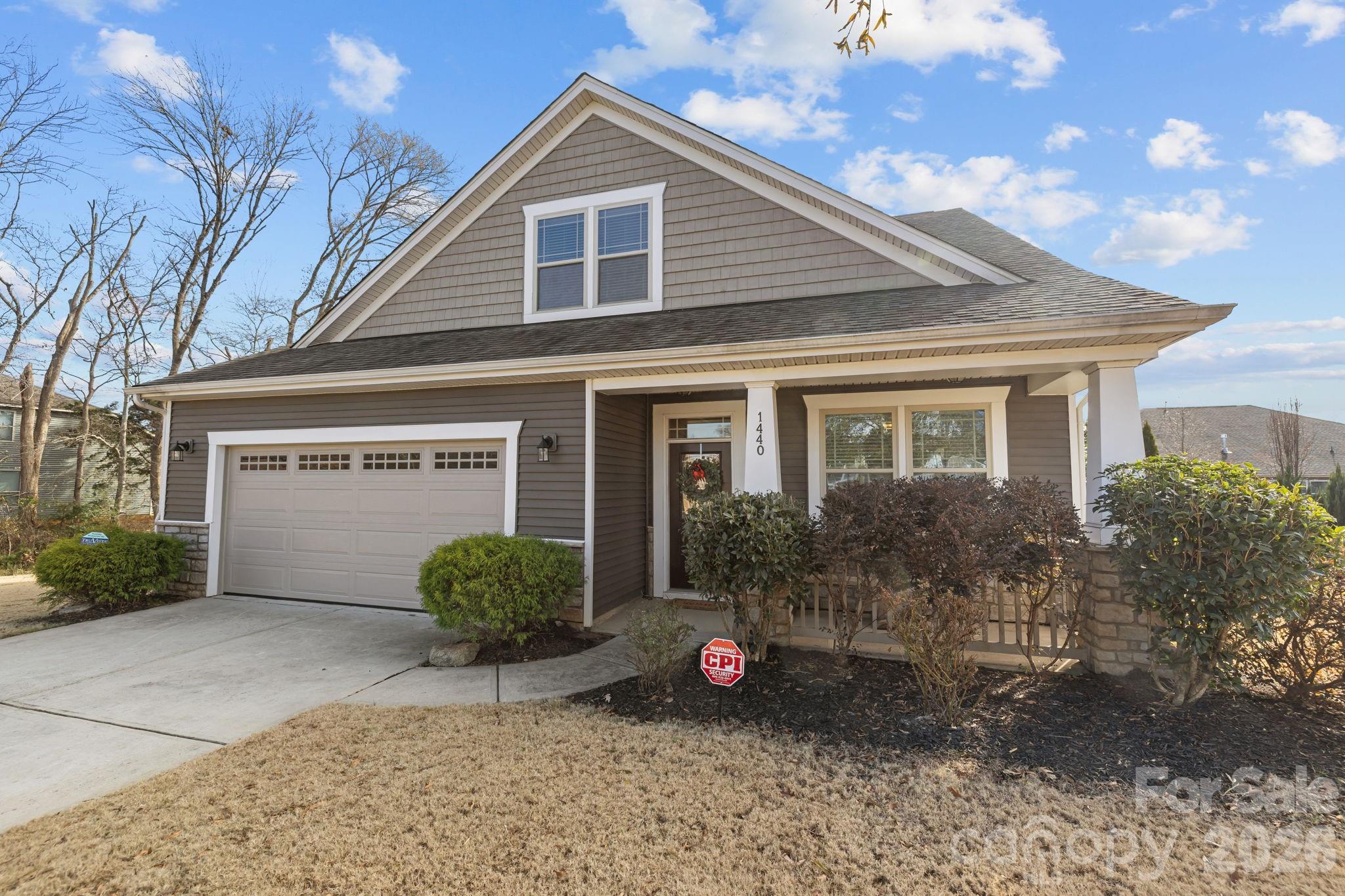 1440 Imperial Court York, SC 29745 - Photo 3 of 47 a front view of a house with a garden