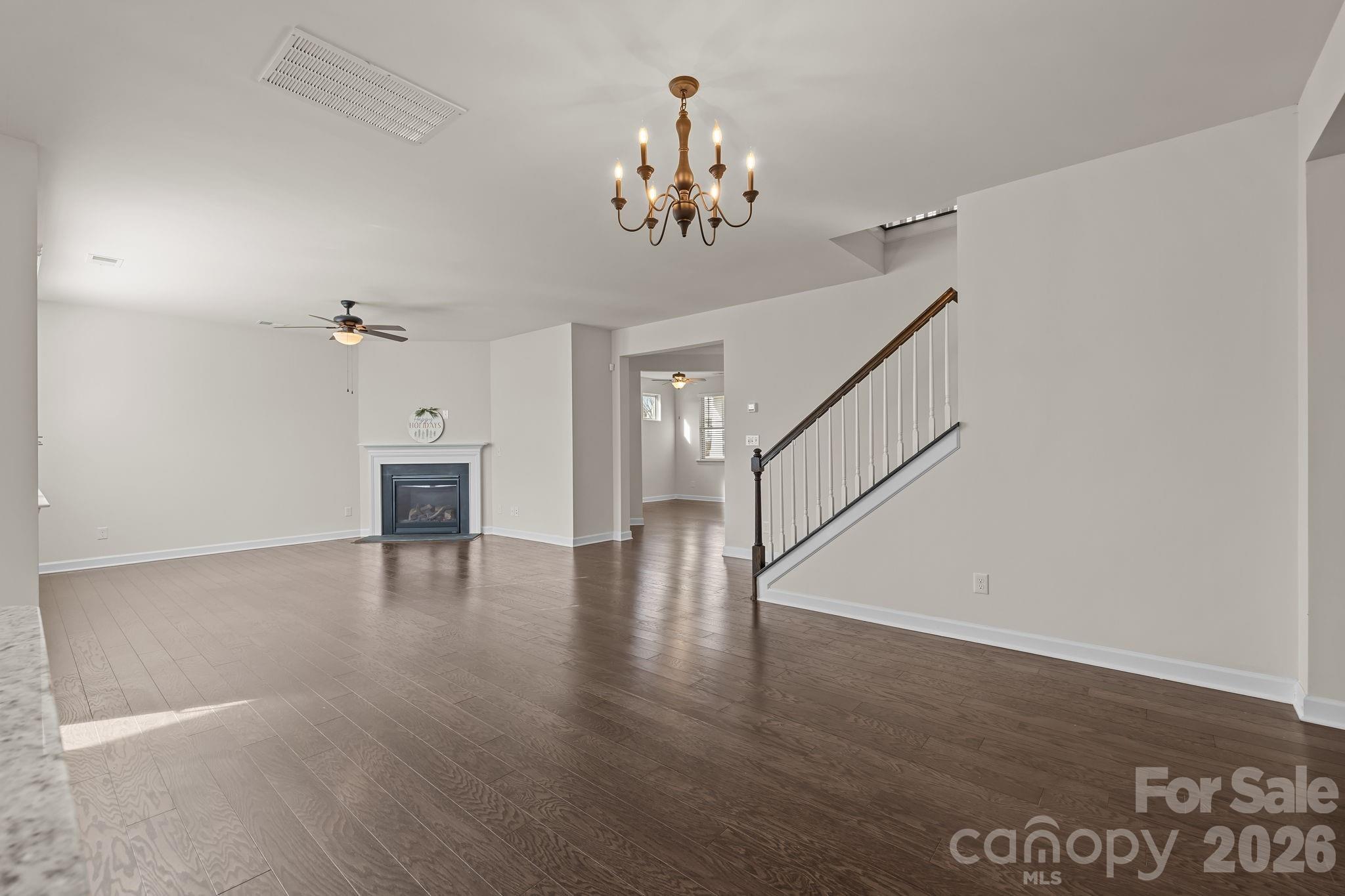 1440 Imperial Court York, SC 29745 - Photo 32 of 47 a view of an empty room with wooden floor and staircase
