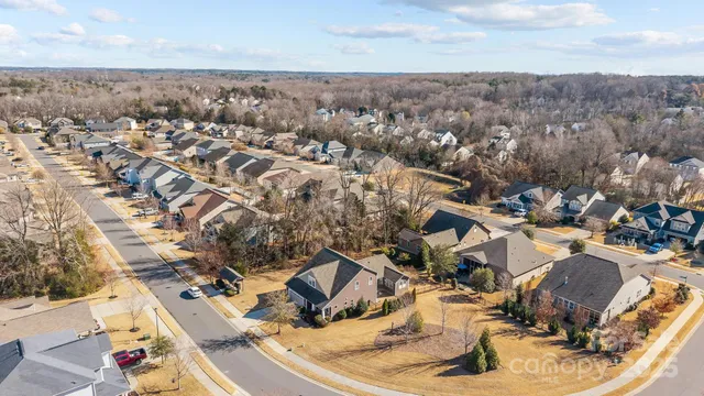 an aerial view of a houses with outdoor space