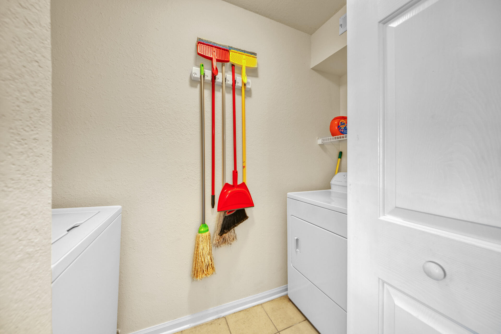 4010 Dancing Cloud Court, Unit 387 Destin, FL 32541 - Photo 15 of 20 a room with a white cabinet and a white walls
