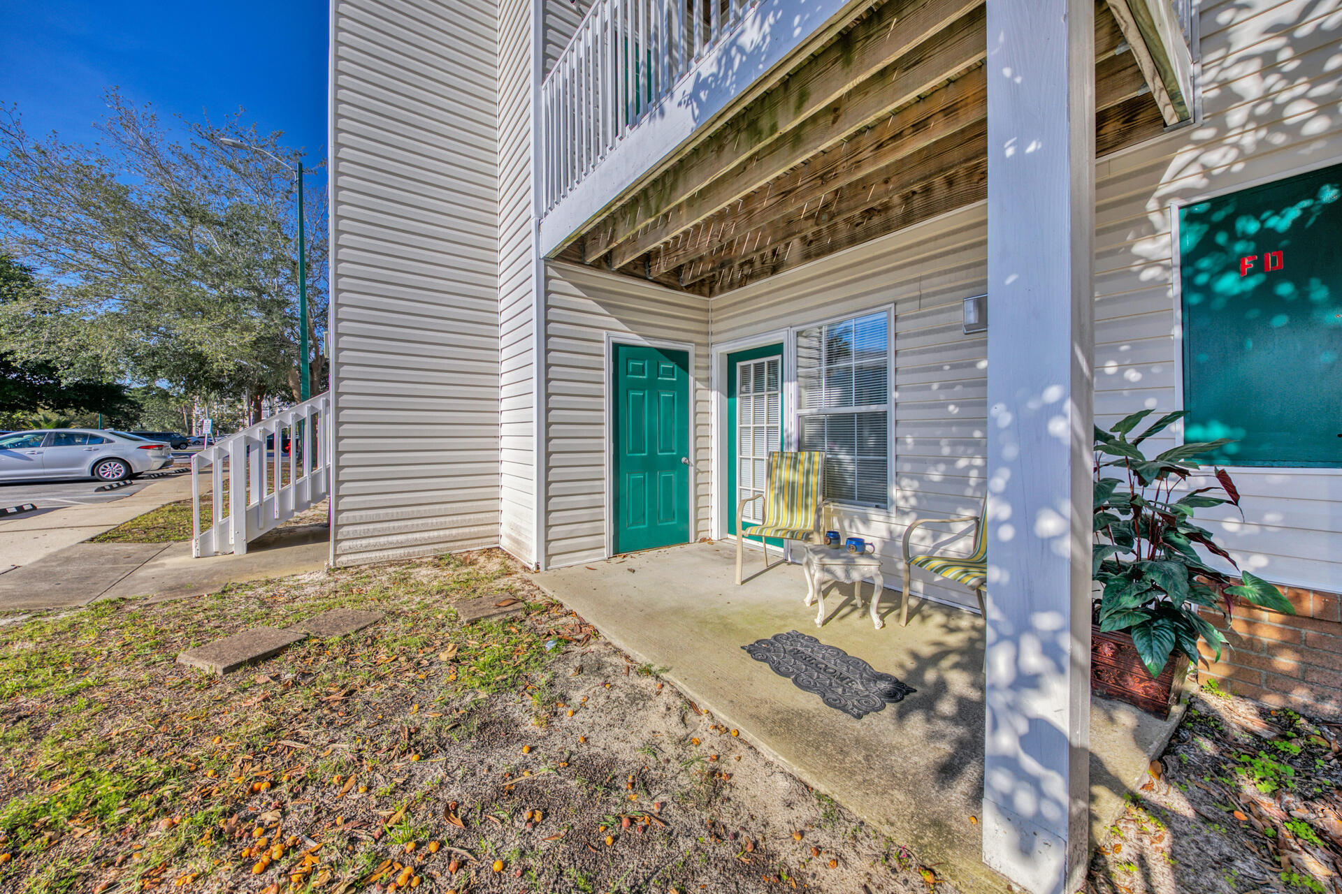 4010 Dancing Cloud Court, Unit 387 Destin, FL 32541 - Photo 16 of 20 a view of a backyard with a patio