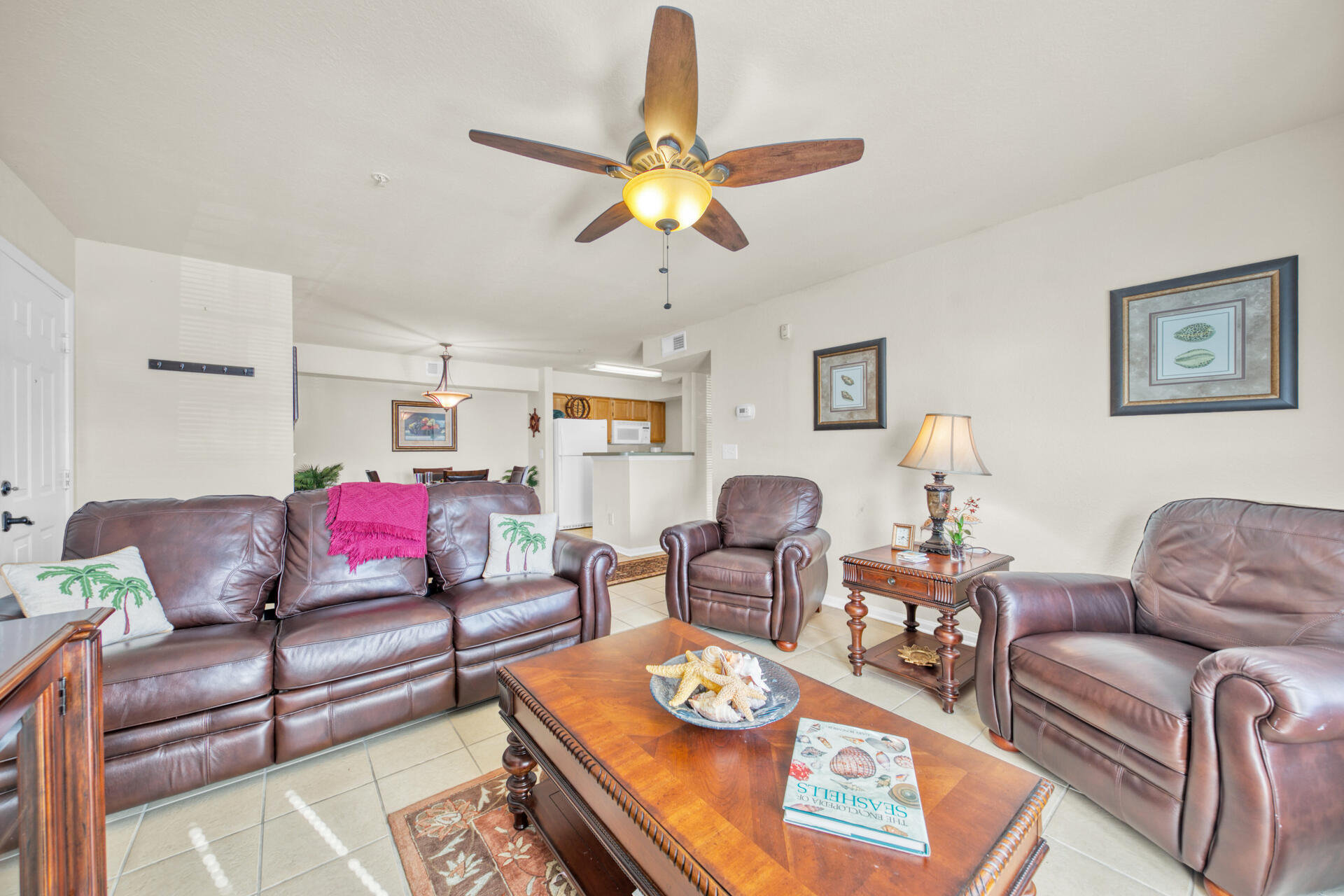 4010 Dancing Cloud Court, Unit 387 Destin, FL 32541 - Photo 2 of 20 a living room with furniture and a dining table
