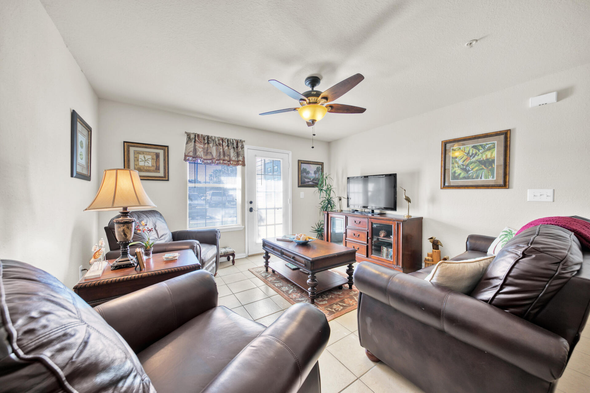 4010 Dancing Cloud Court, Unit 387 Destin, FL 32541 - Photo 3 of 20 a living room with furniture a couch and a window