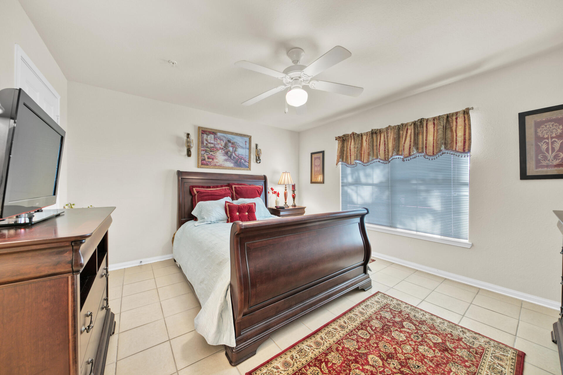 4010 Dancing Cloud Court, Unit 387 Destin, FL 32541 - Photo 10 of 20 a living room with furniture and a flat screen tv