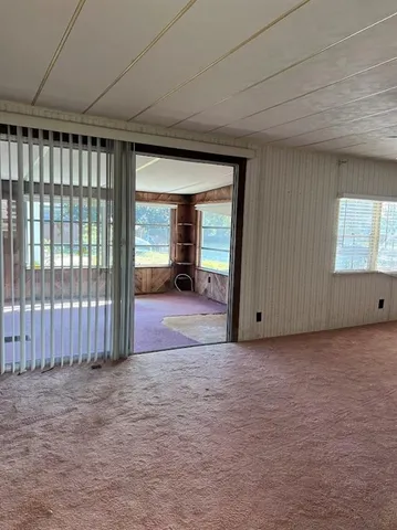 a view of a room with a large window