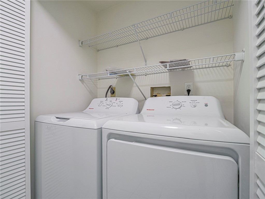 8520 Highway 1, Unit H12 Sebastian, FL 32976 - Photo 26 of 35 a utility room with dryer and washer