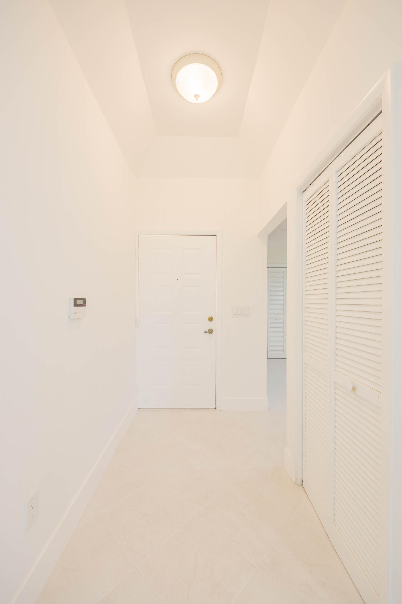 7520 La Paz Boulevard, Unit 104 Boca Raton, FL 33433 - Photo 12 of 56 a view of cupboard
