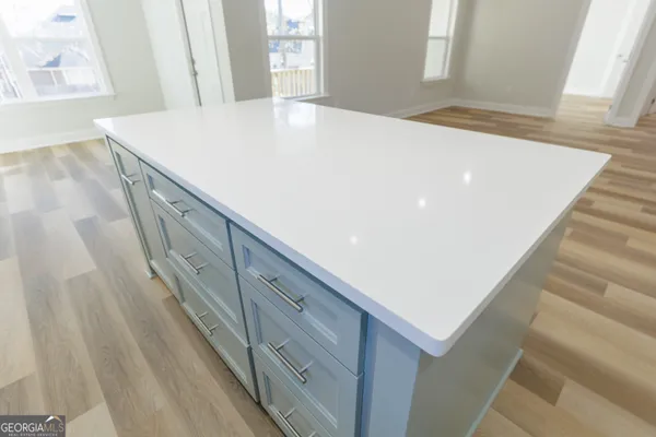 a view of wooden floor and staircase