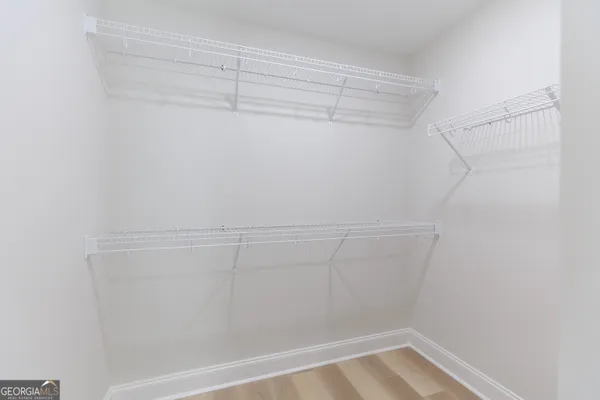 a view of a room with racks on the wall