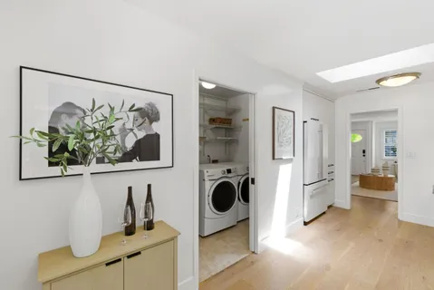 a view of a hallway with a workspace