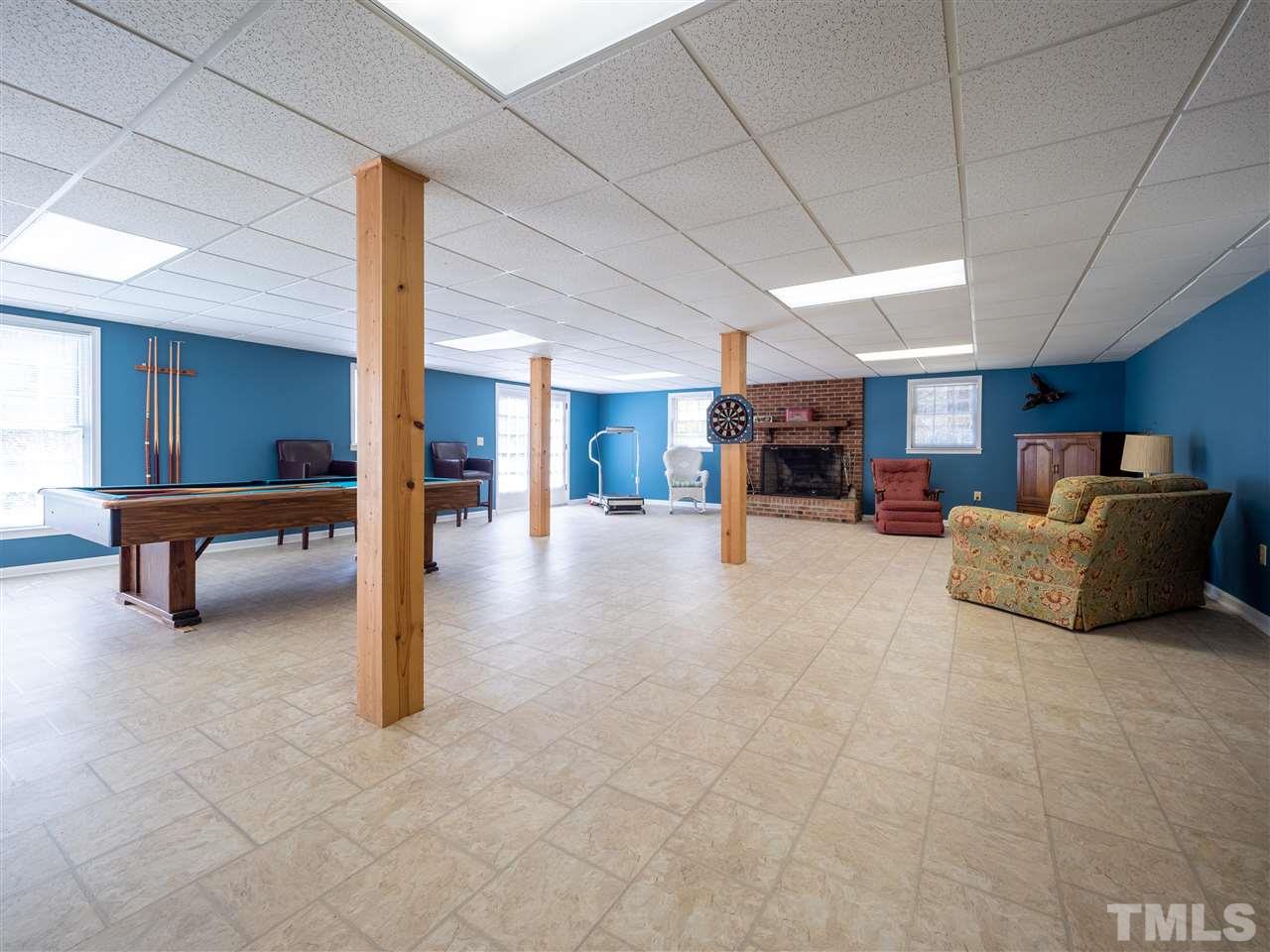1000 Arrow Leaf Circle Cary, NC 27519 - Photo 21 of 25 a living room with furniture and a table