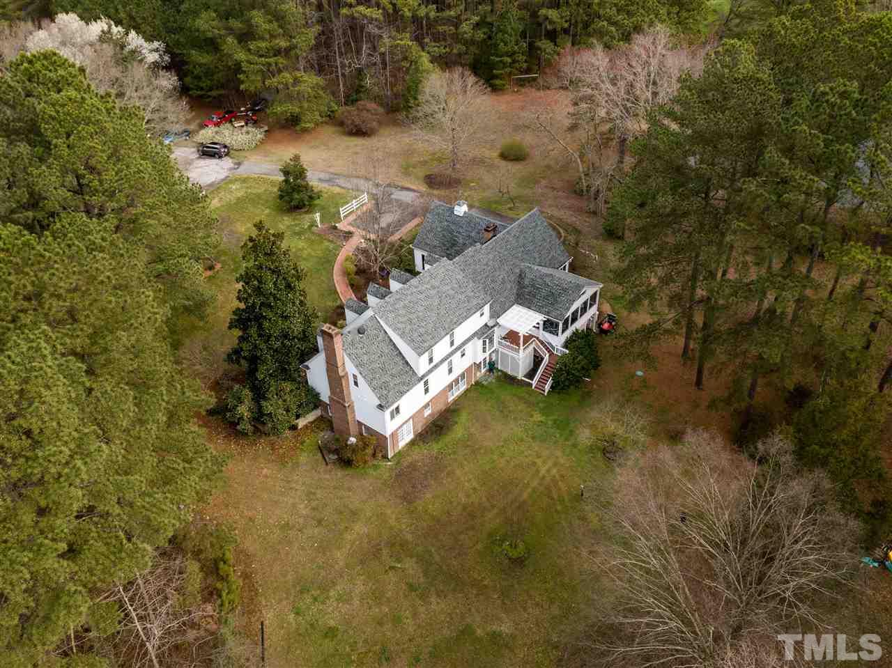 1000 Arrow Leaf Circle Cary, NC 27519 - Photo 5 of 25 an aerial view of a house with a yard basket ball court and outdoor seating