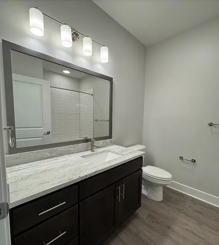a bathroom with a bathtub and shower