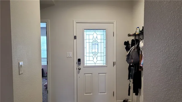 a door view with a mirror