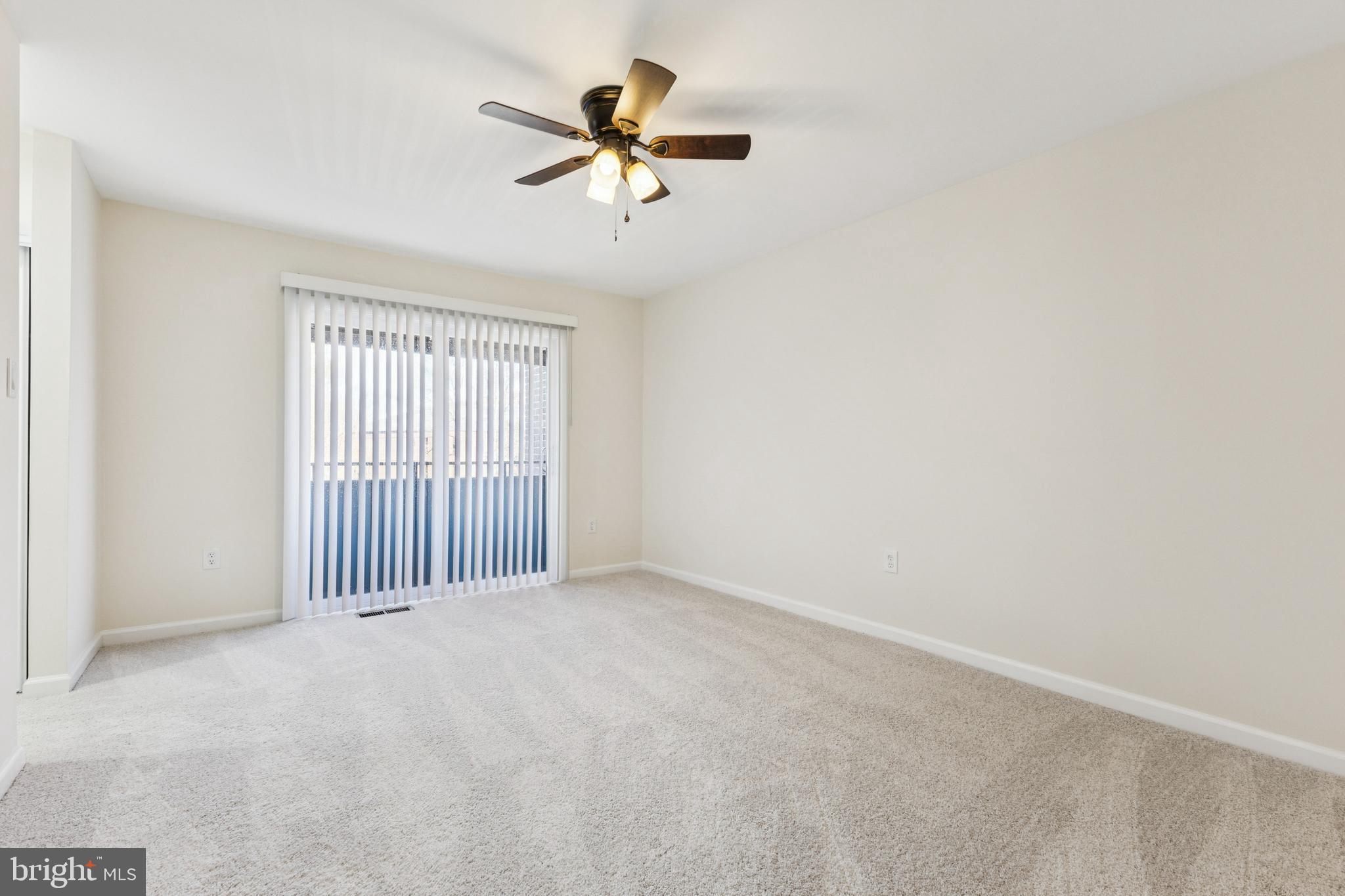 2015 Wethersfield Court Reston, VA 20191 - Photo 16 of 24 a view of a livingroom with a ceiling fan