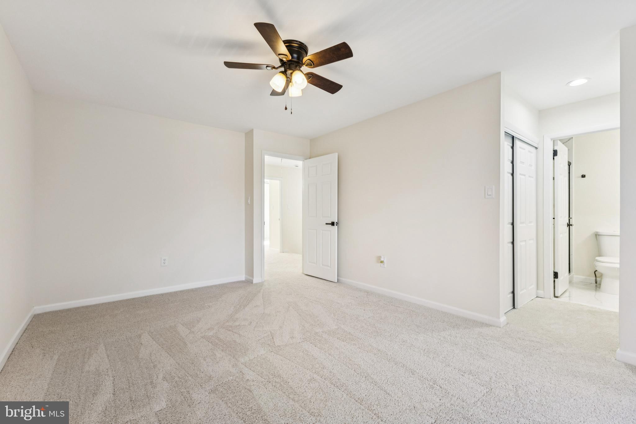 2015 Wethersfield Court Reston, VA 20191 - Photo 17 of 24 an empty room with closet and a ceiling fan