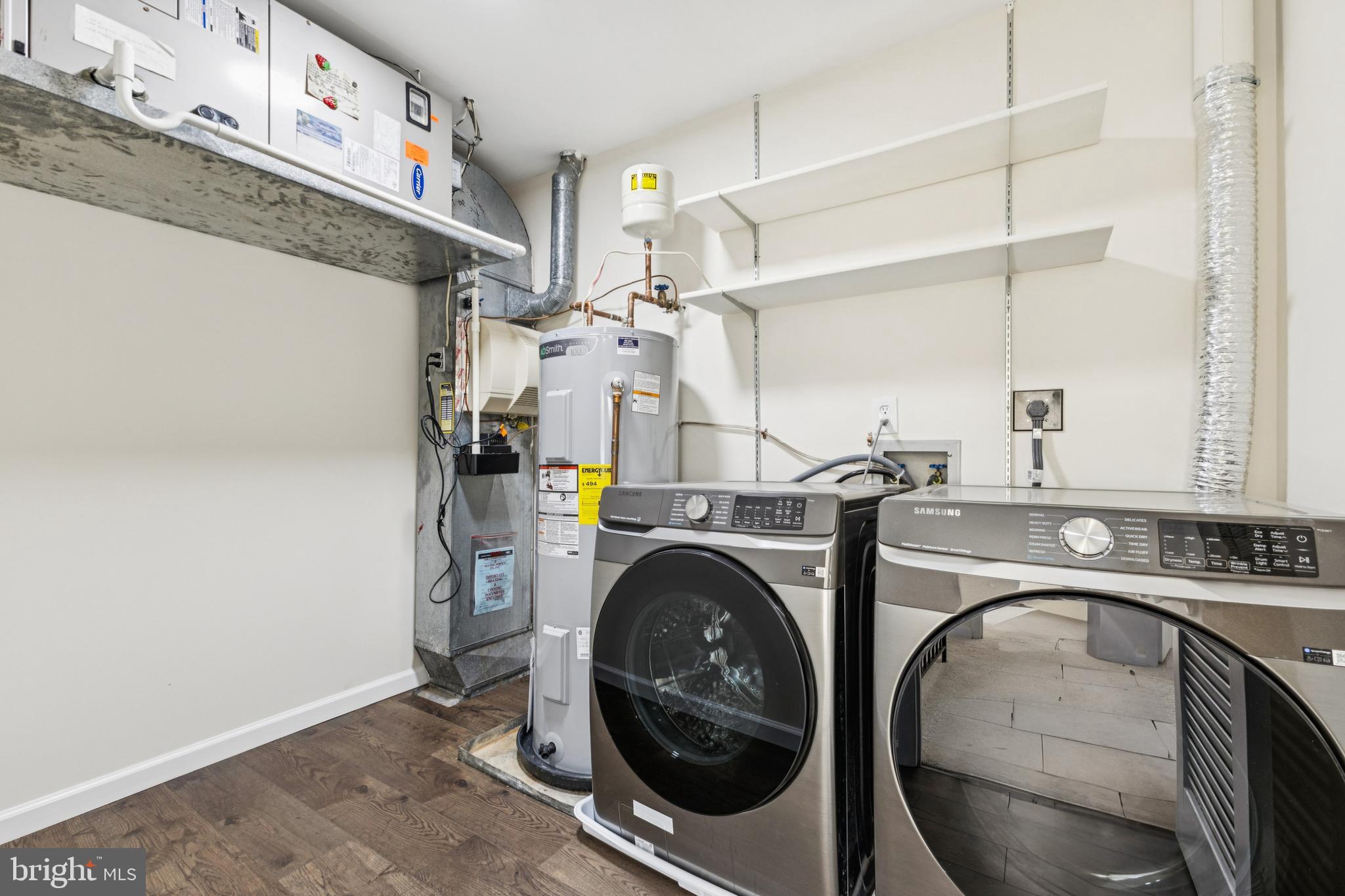 2015 Wethersfield Court Reston, VA 20191 - Photo 19 of 24 a utility room with dryer and washer
