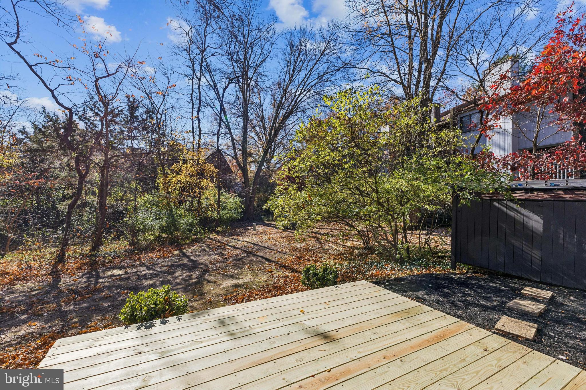 2015 Wethersfield Court Reston, VA 20191 - Photo 23 of 24 a wooden bench sitting on top of a wooden floor