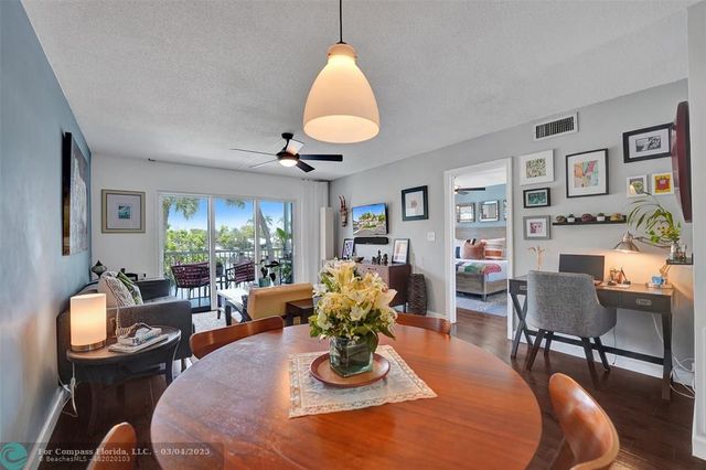 a kitchen with stainless steel appliances a sink and a refrigerator