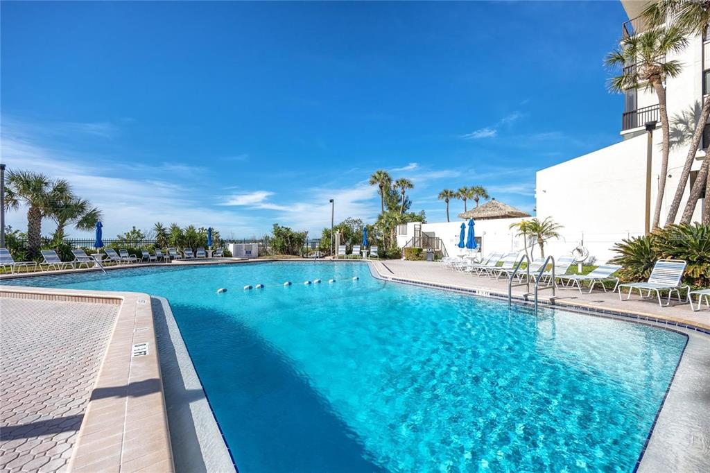 15000 Gulf Boulevard, Unit 1108 Madeira Beach, FL 33708 - Photo 9 of 20 a view of a swimming pool and outdoor space